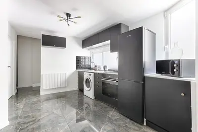Cuisine ou kitchenette dans l'établissement Amazing Luxury Triplex 3BR - 6P - Arc de Triomphe