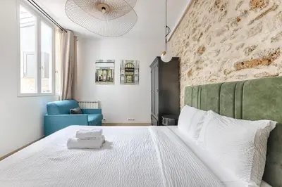 Un ou plusieurs lits dans un hébergement de l'établissement MyKeypers - Splendid Parisian Flat 6P - 2 Bedrooms - Rue Montorgueil