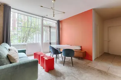 Coin salon dans l'établissement MyKeypers - Splendid Parisian Flat 6P - 2 Bedrooms - Rue Montorgueil