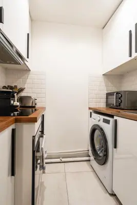 Cuisine ou kitchenette dans l'établissement Stylish Duplex 6P - Bastille,Gare de Lyon