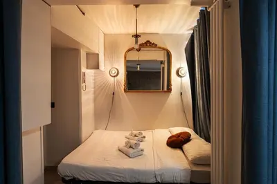 Un ou plusieurs lits dans un hébergement de l'établissement Stylish Duplex 6P - Bastille,Gare de Lyon