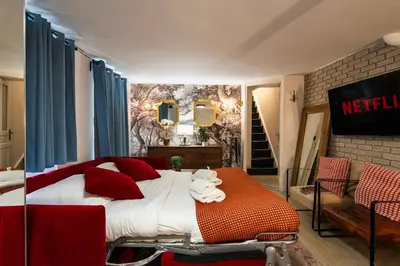 Un ou plusieurs lits dans un hébergement de l'établissement Stylish Duplex 6P - Bastille,Gare de Lyon