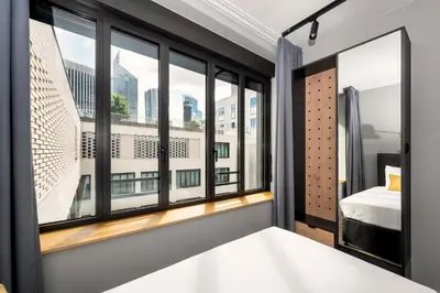Un ou plusieurs lits dans un hébergement de l'établissement Staycity Aparthotels Paris La Defense