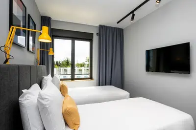 Télévision ou salle de divertissement dans l'établissement Staycity Aparthotels Paris La Defense