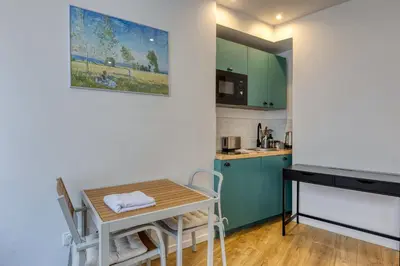Cuisine ou kitchenette dans l'établissement Les Vignes de Montmartre - Studio