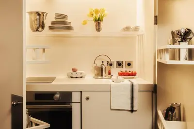 Cuisine ou kitchenette dans l'établissement Pied A Terre Tuileries