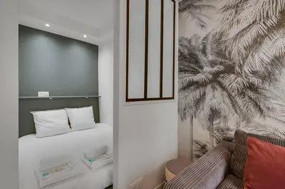 Un ou plusieurs lits dans un hébergement de l'établissement 228 Suite Romy - Superbe Appartement à Paris