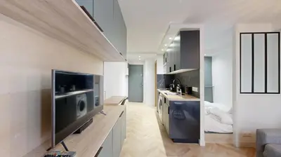 Télévision ou salle de divertissement dans l'établissement 228 Suite Romy - Superbe Appartement à Paris
