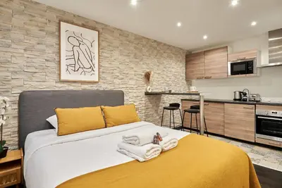 Cuisine ou kitchenette dans l'établissement Studio Le Marais by Studio prestige