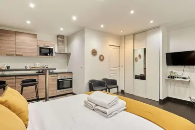 Cuisine ou kitchenette dans l'établissement Studio Le Marais by Studio prestige