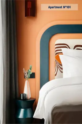 Un ou plusieurs lits dans un hébergement de l'établissement Edgar Suites Louvre - Jour