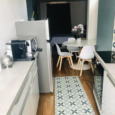 Cuisine ou kitchenette dans l'établissement Mêla