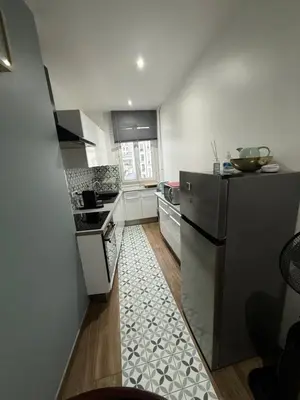 Cuisine ou kitchenette dans l'établissement Mêla