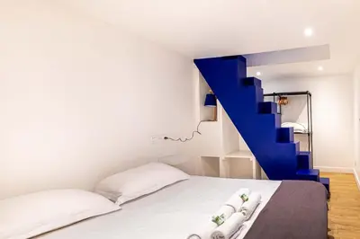 Un ou plusieurs lits dans un hébergement de l'établissement Disponible - Paris - All Equipped Souplex - Mezzanine Bedrooms - From 1 to 6 Guests - Departure up to 11am - Entrance from 4 pm