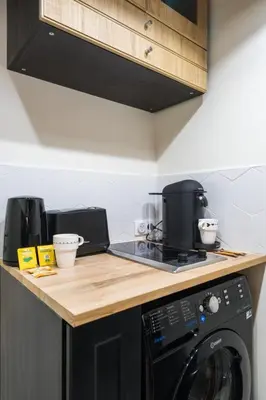 Cuisine ou kitchenette dans l'établissement Cosy and peaceful studio - 2P - Paris Center