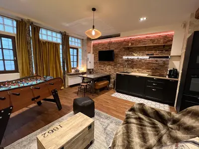 Cuisine ou kitchenette dans l'établissement GOOD VIBES Luxurious Loft in Paris 11th, with AC & table football