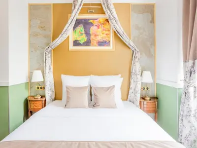 Un ou plusieurs lits dans un hébergement de l'établissement Merveil - Luxury Suite - Notre-Dame - Saint Louis