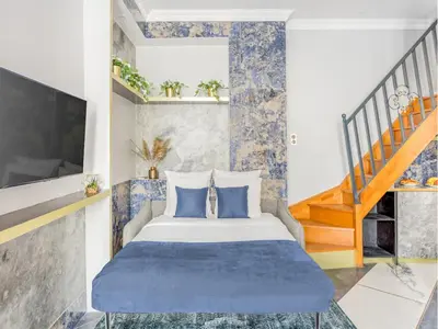 Un ou plusieurs lits dans un hébergement de l'établissement Merveil - Luxury Suite - Notre-Dame - Saint Louis