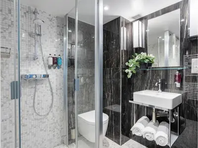Salle de bains dans l'établissement Merveil - Luxury Suite - Notre-Dame - Saint Louis