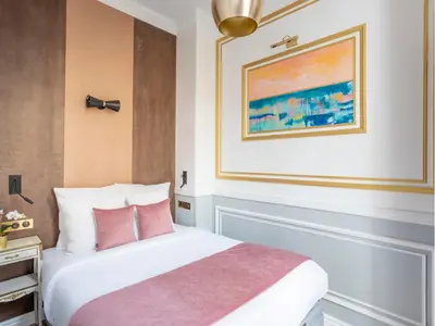 Un ou plusieurs lits dans un hébergement de l'établissement Merveil - Luxury Suite - Notre-Dame - Saint Louis