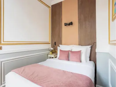 Un ou plusieurs lits dans un hébergement de l'établissement Merveil - Luxury Suite - Notre-Dame - Saint Louis