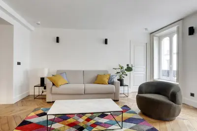 Coin salon dans l'établissement Apartments in the heart of Paris in Sentier