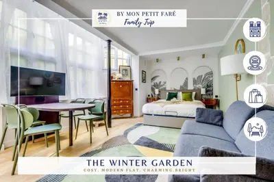 Télévision ou salle de divertissement dans l'établissement Le Jardin d'Hiver - Lumineux - by Mon Petit Faré