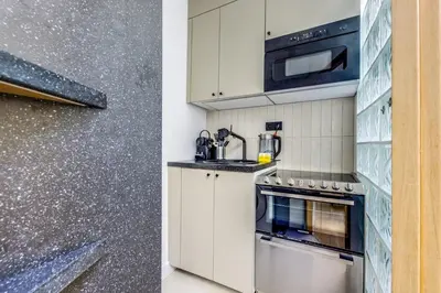 Cuisine ou kitchenette dans l'établissement Le Jardin d'Hiver - Lumineux - by Mon Petit Faré