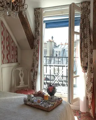 Un ou plusieurs lits dans un hébergement de l'établissement Hotel Caron de Beaumarchais