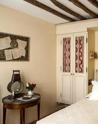 Un ou plusieurs lits dans un hébergement de l'établissement Hotel Caron de Beaumarchais