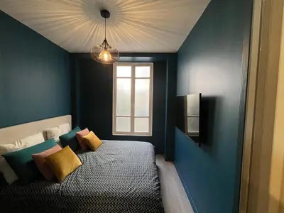 Un ou plusieurs lits dans un hébergement de l'établissement Relais Cocorico 2 Bedrooms with AC, 2 bathrooms, 8 min Eiffel Tower