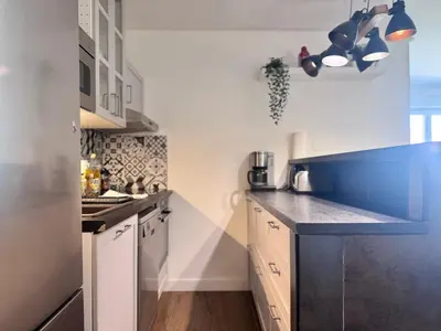 Cuisine ou kitchenette dans l'établissement FRUITIERS3