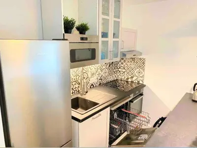 Cuisine ou kitchenette dans l'établissement FRUITIERS3