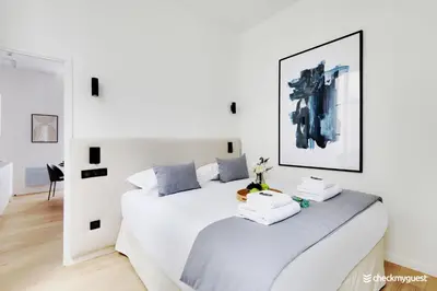 Un ou plusieurs lits dans un hébergement de l'établissement Beautiful apartment 1BR-4P - Le Marais