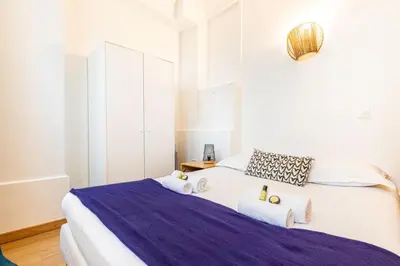 Un ou plusieurs lits dans un hébergement de l'établissement GuestReady - Lovely Parisian Apartment for 4pax.