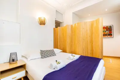 Un ou plusieurs lits dans un hébergement de l'établissement GuestReady - Lovely Parisian Apartment for 4pax.