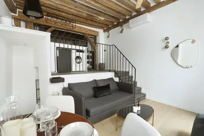 Coin salon dans l'établissement Apartment Saint Germain des Prés by Studio prestige