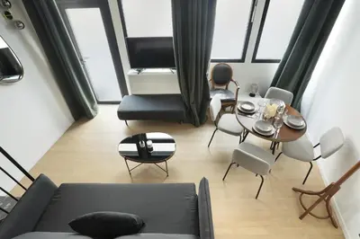 Coin salon dans l'établissement Apartment Saint Germain des Prés by Studio prestige