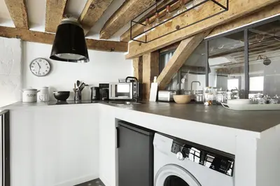 Cuisine ou kitchenette dans l'établissement Apartment Saint Germain des Prés by Studio prestige