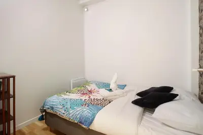 Un ou plusieurs lits dans un hébergement de l'établissement Apartment Saint Germain des Prés by Studio prestige