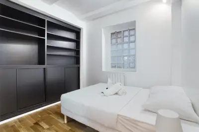 Un ou plusieurs lits dans un hébergement de l'établissement Apartment Saint Germain des Prés by Studio prestige