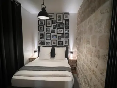 Un ou plusieurs lits dans un hébergement de l'établissement Loft Jaures