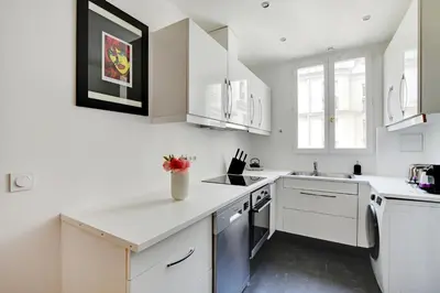 Cuisine ou kitchenette dans l'établissement Exclusive apartment - 1BR-4P - Arc de Triomphe