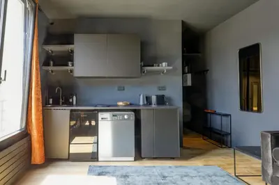 Cuisine ou kitchenette dans l'établissement Appartement Palais Royal