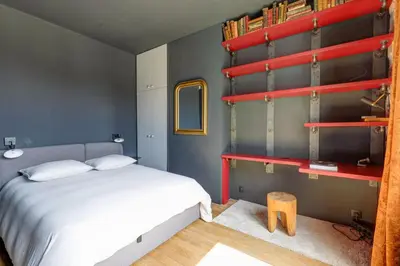 Un ou plusieurs lits dans un hébergement de l'établissement Appartement Palais Royal
