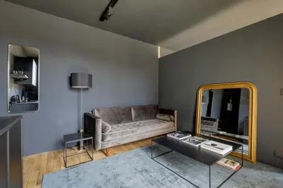 Télévision ou salle de divertissement dans l'établissement Appartement Palais Royal