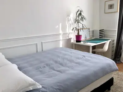 Un ou plusieurs lits dans un hébergement de l'établissement Paris charm suite authentique, quartier latin, 2/4 pers