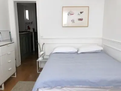 Un ou plusieurs lits dans un hébergement de l'établissement Paris charm suite authentique, quartier latin, 2/4 pers