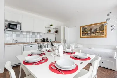 Cuisine ou kitchenette dans l'établissement Appartement Magenta Quest