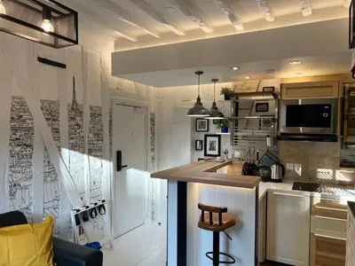 Cuisine ou kitchenette dans l'établissement Au Passage des Marais - City Centre
